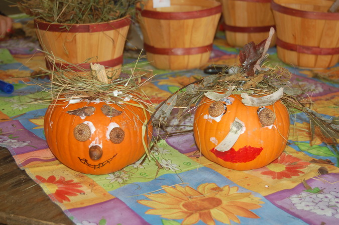His and hers decorated pumpkins