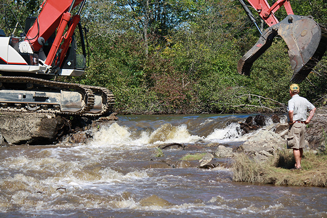 An excavator removes an ancient dam from Goff Mill Brook on the Arundel / Kennebunkport line.