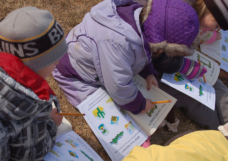 Kids work on their Wild Friends in Wild Places journals