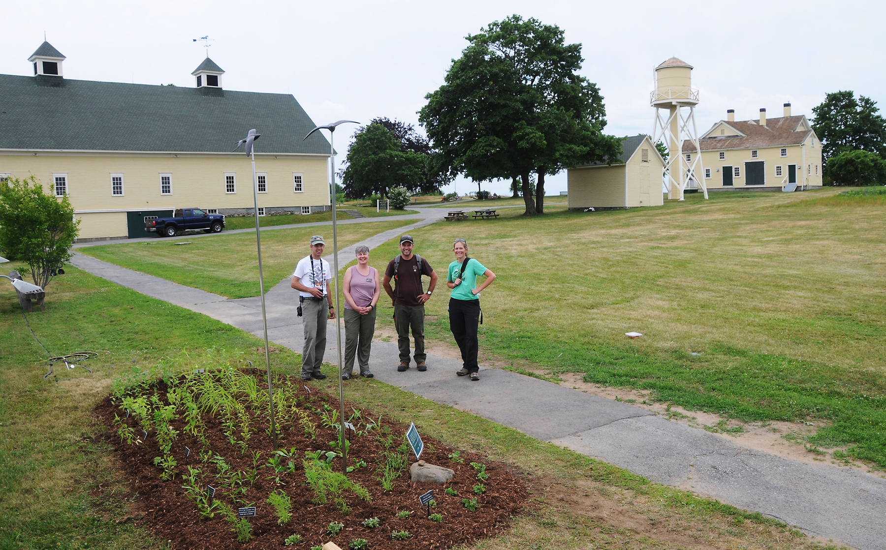 Newly installed Pollinator Garden with some of the crew who planted it on the Laudholm campus in June 2018. Photo © Allan Amioka