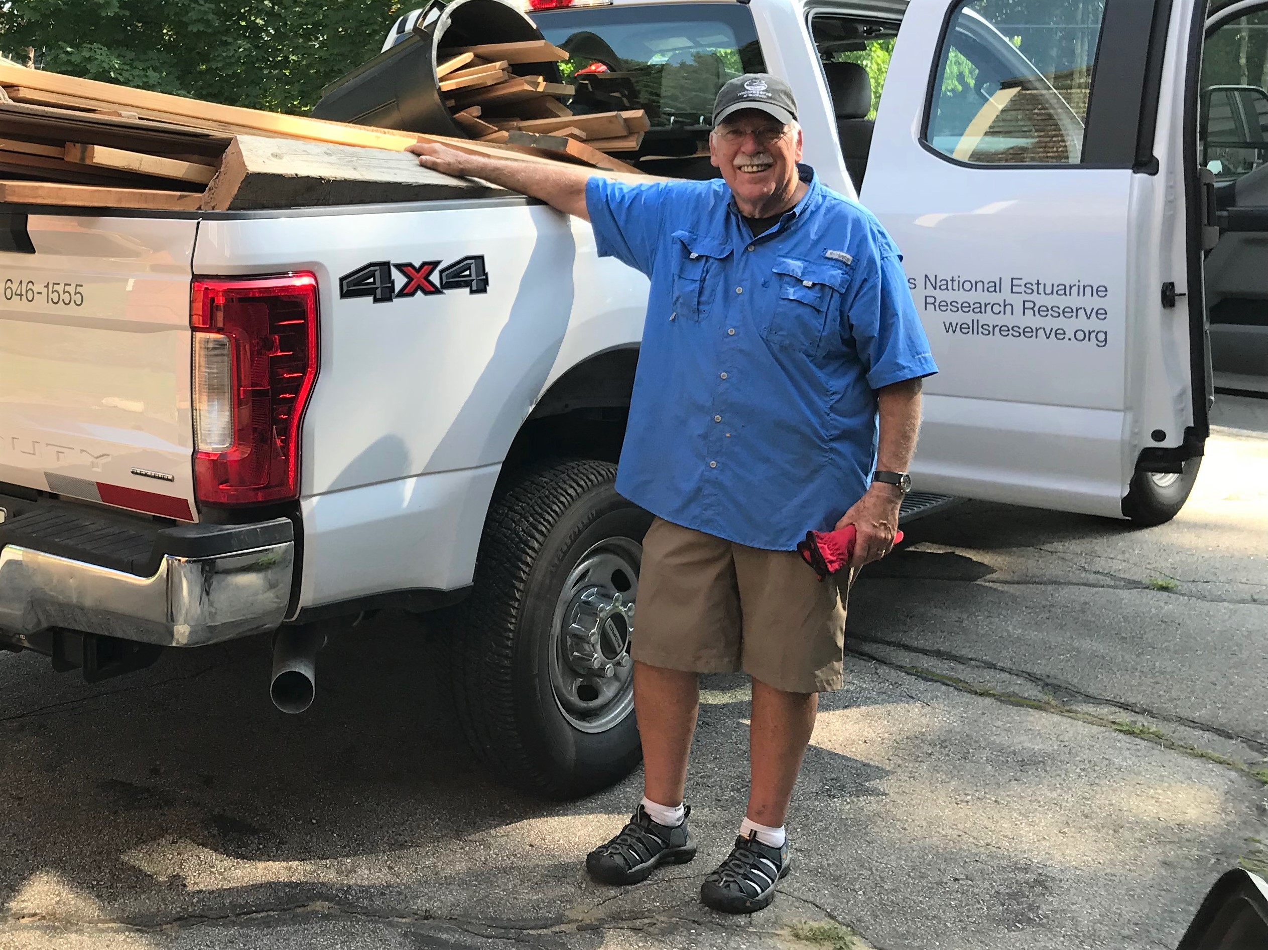 Volunteer Peter Anthony loads up a generous donation of quality wood from the Smith-Valley family of Kennebunk. Photo by Lynne Vachon