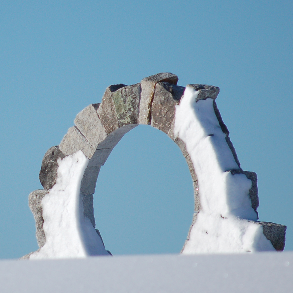 PORTAL sculpture after windblown snowfall with blue sky background. Photo: Scott Richardson.