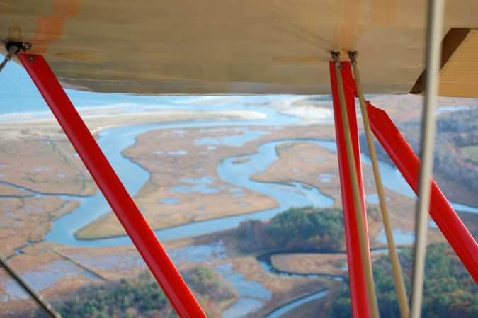 Little River estuary through the biplane's struts