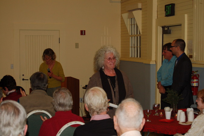 Judy Cohen receiving her award