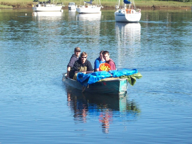 Wells Reserve and UNE interns returning from collecting the fyke nets.