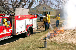 Truck at controlled burn, 17 April 2009